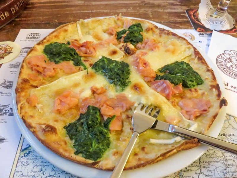 a Dutch pancake with salmon and spinach
