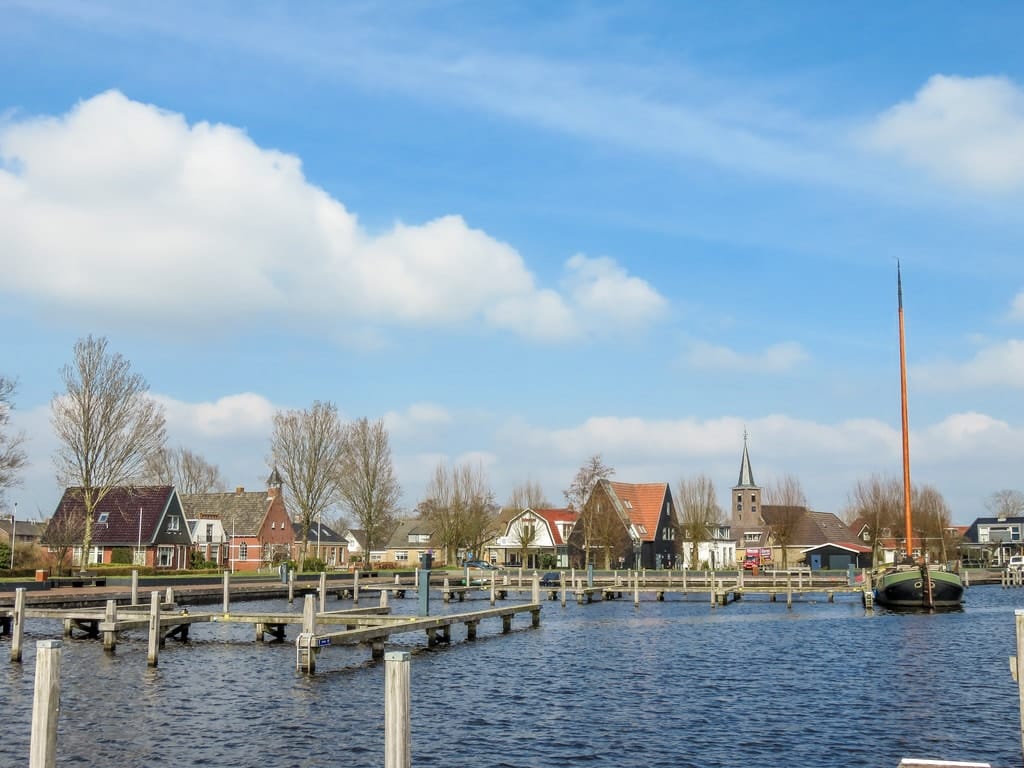 waterfront of a small village as seen from the water, Earnewald Friesland