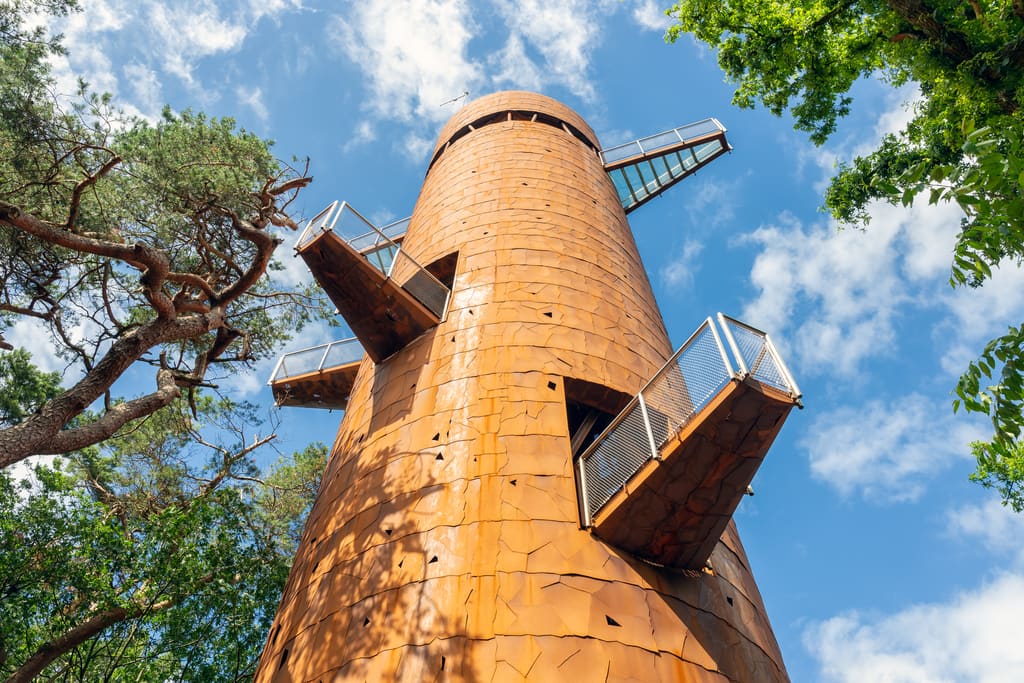 a tall observation tower with observation decks sticking out of it, The Bosberg Tower at Appelscha, Friesland