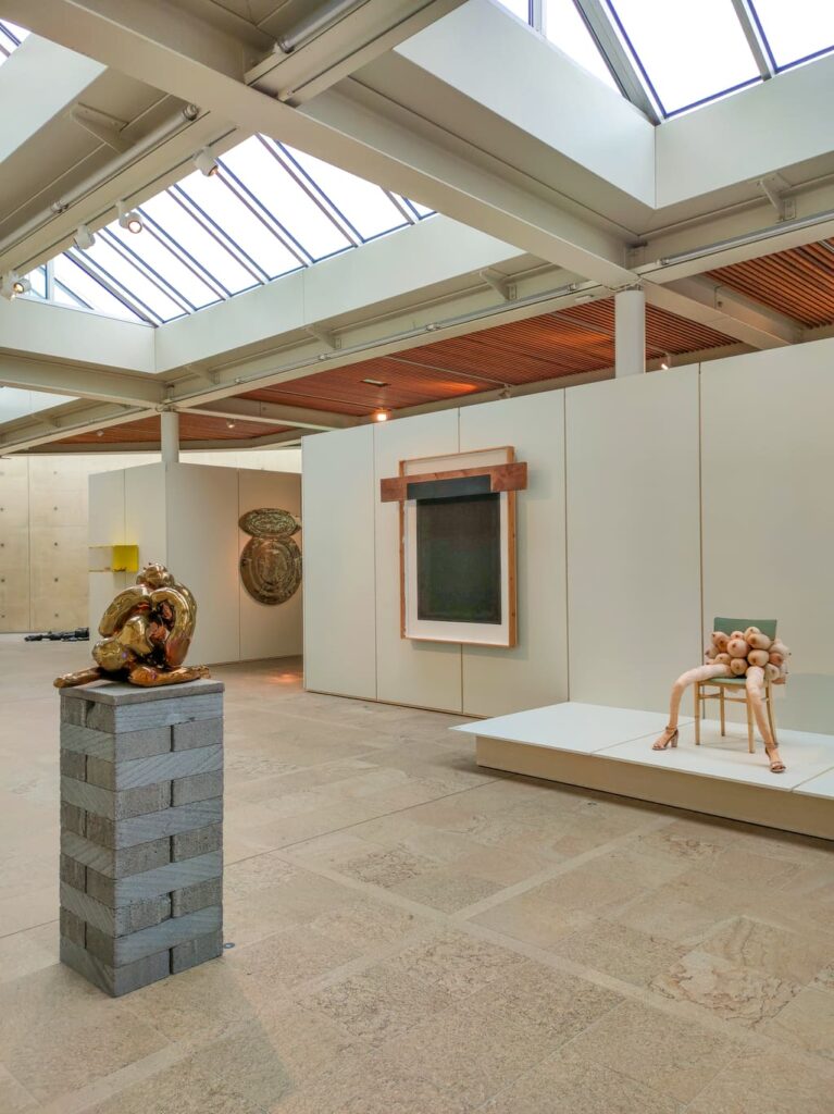 a modern building with skylights and contemporary sculptures exhibited; Museum Beelden aan Zee in Scheveningen